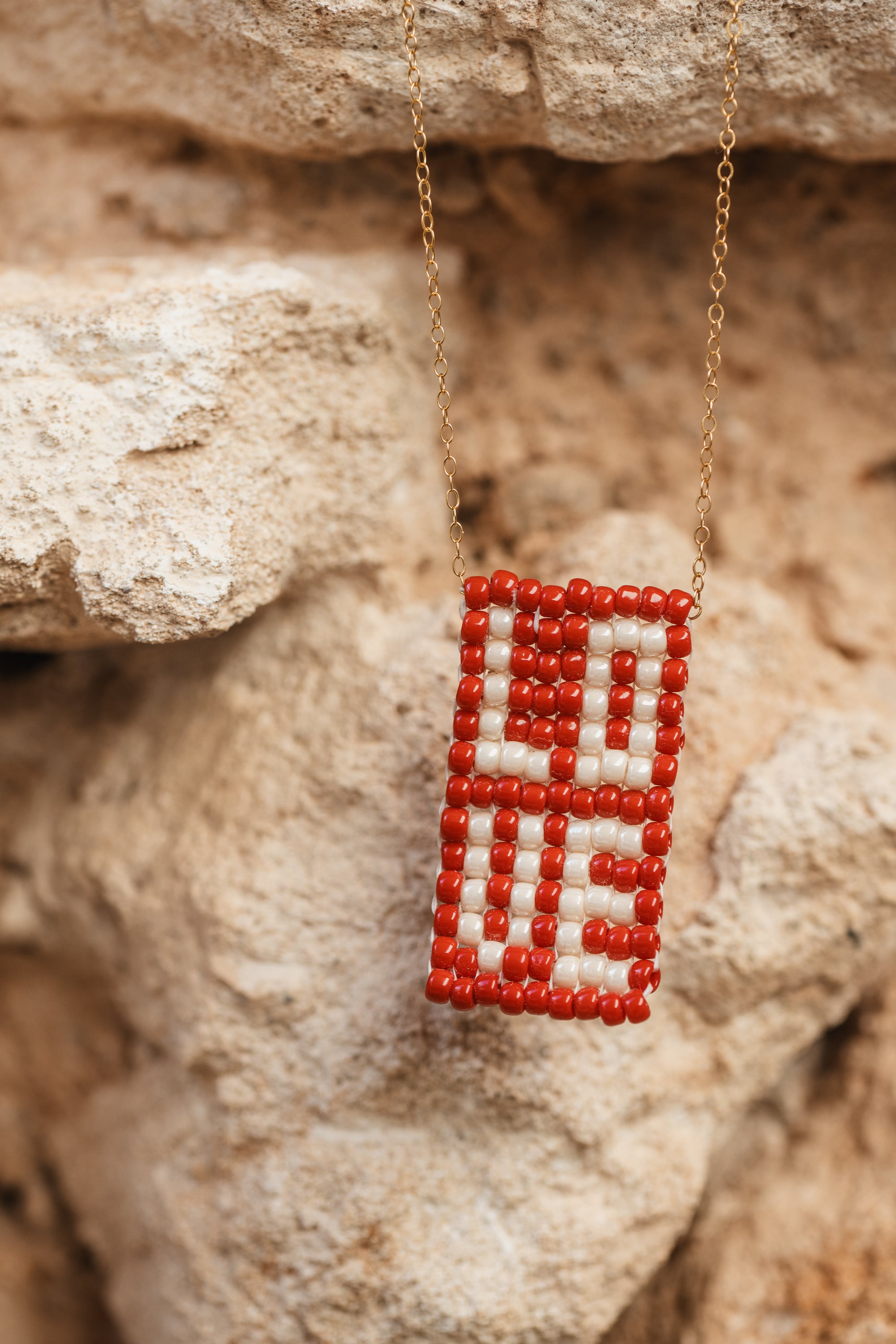 Love necklace, white on red